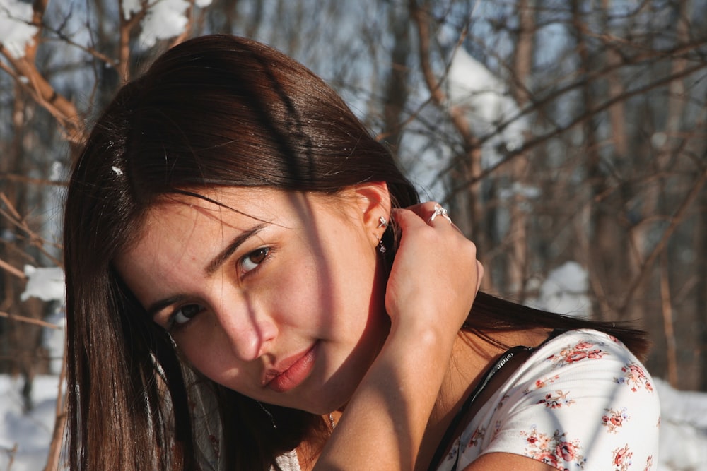 woman holding her hair