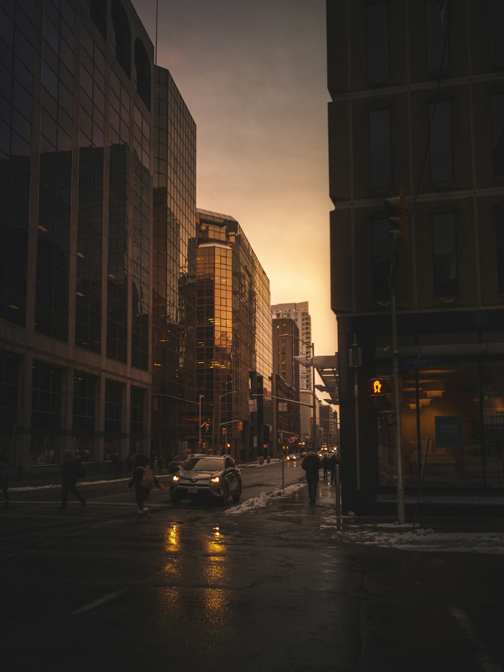 a city street filled with lots of tall buildings