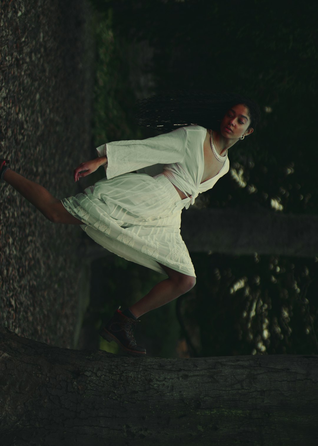 woman in white long-sleeved dress