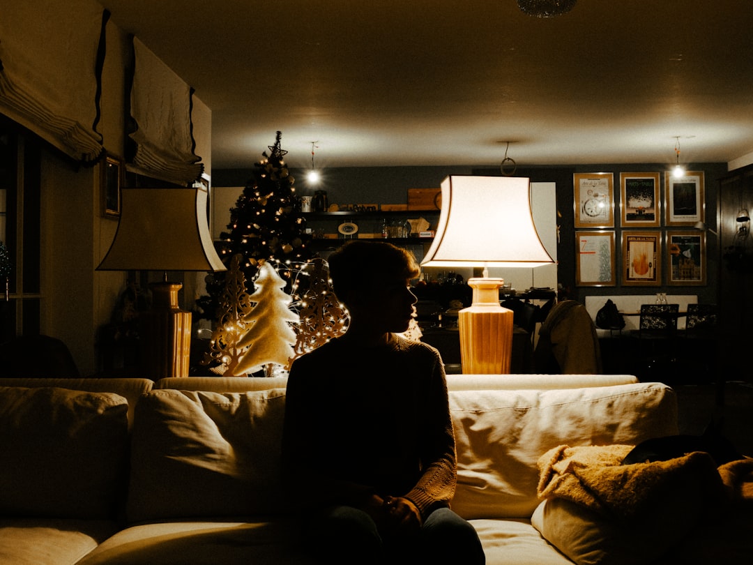 boy sitting on sofa