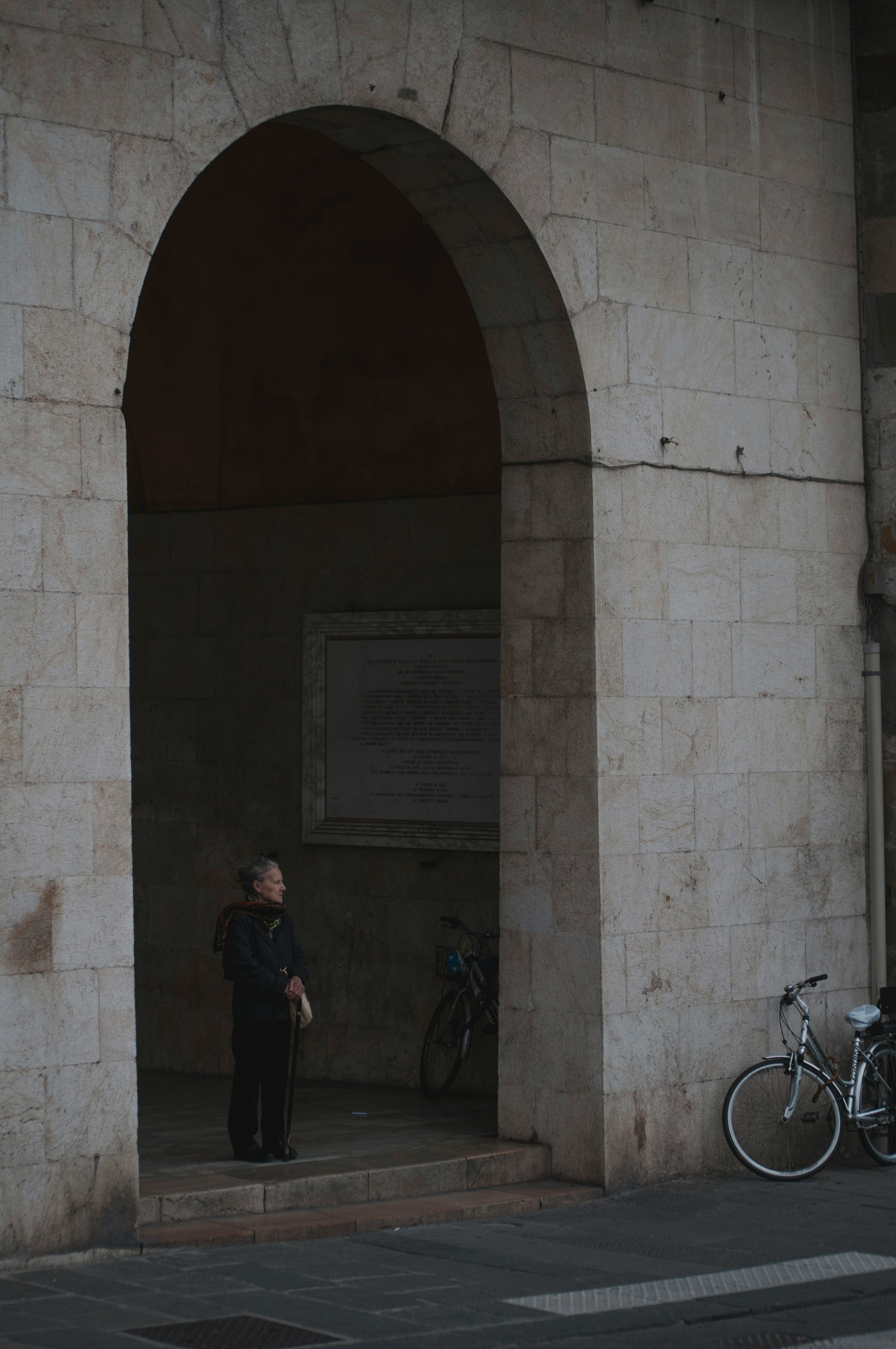 man standing beside door