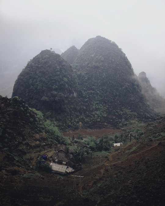 mountains during day in Hà Giang Vietnam