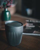 cup with lid on table