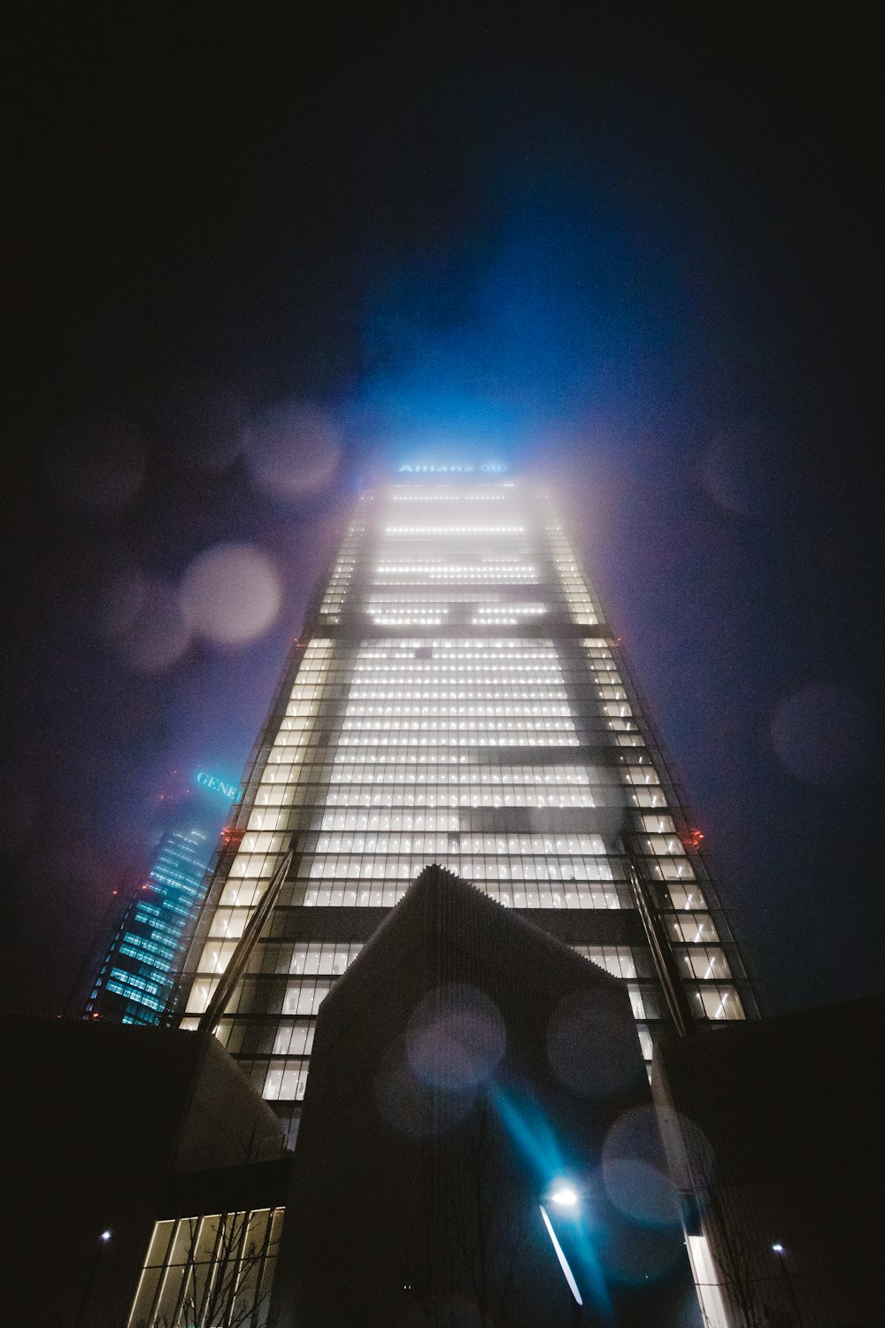 architectural photography of lighted city building