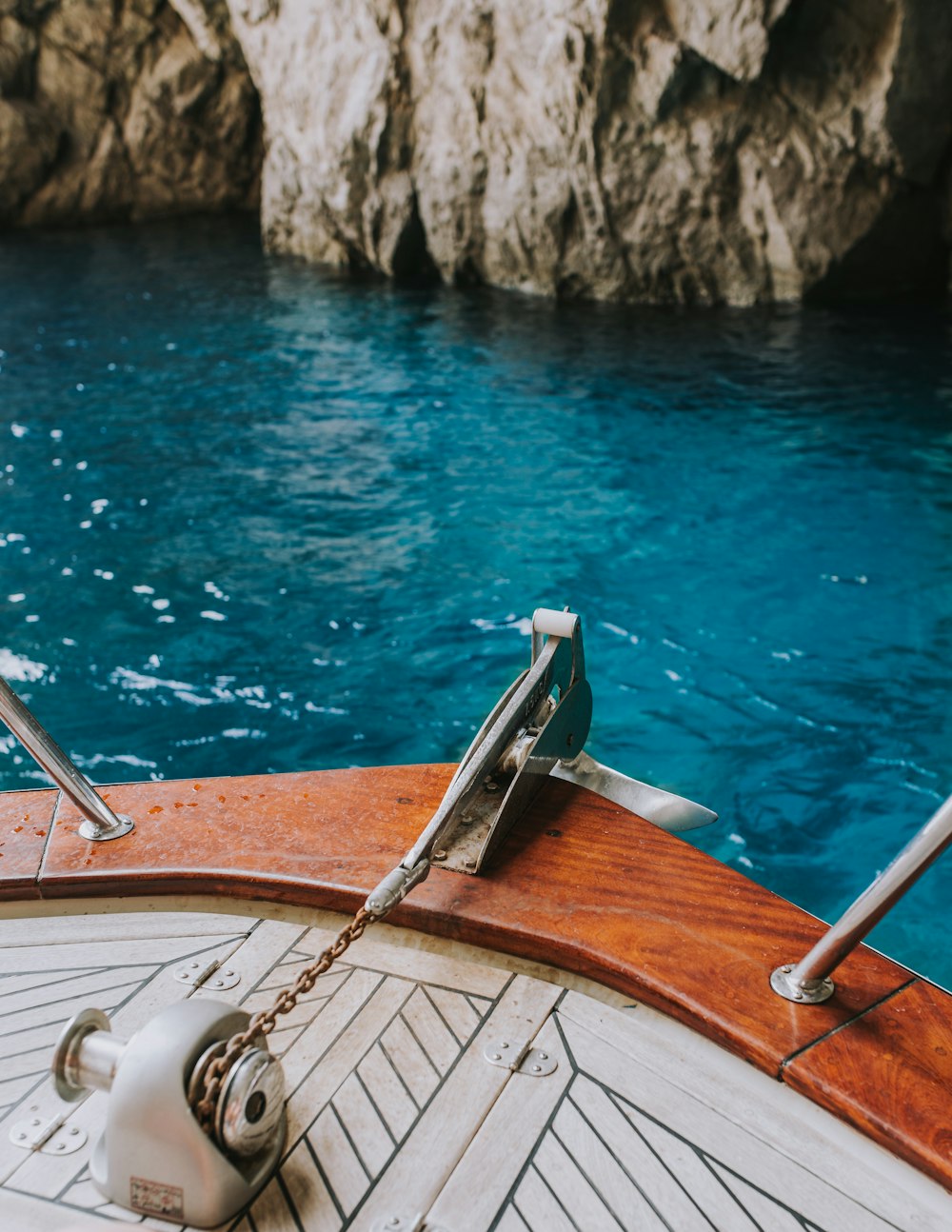 white and brown boat