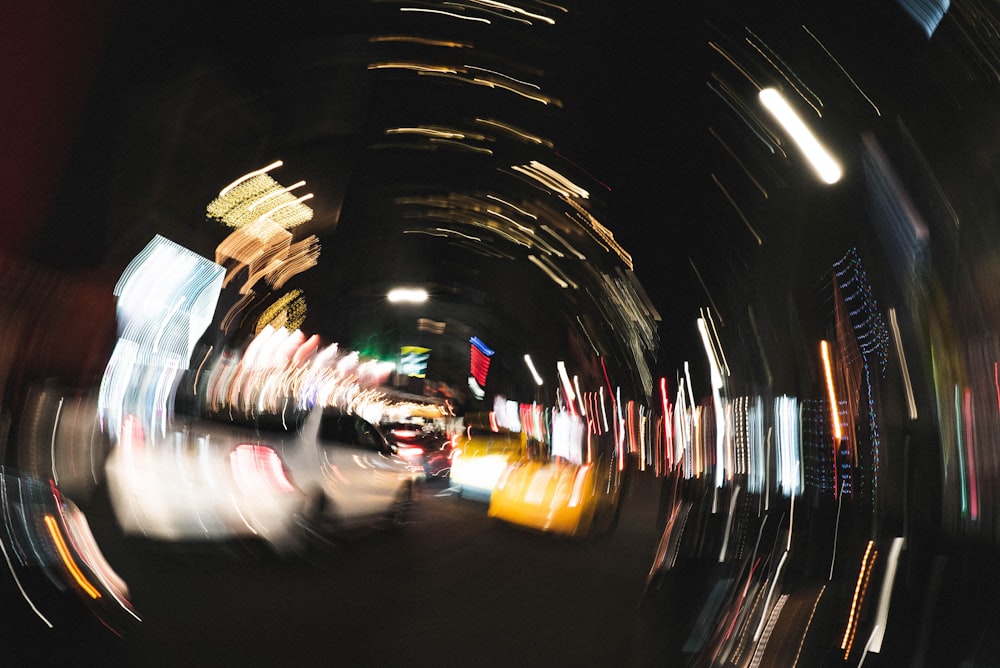 a blurry photo of a city street at night