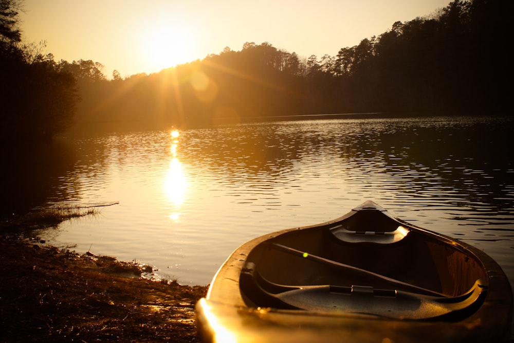 boat on the seashore photograph