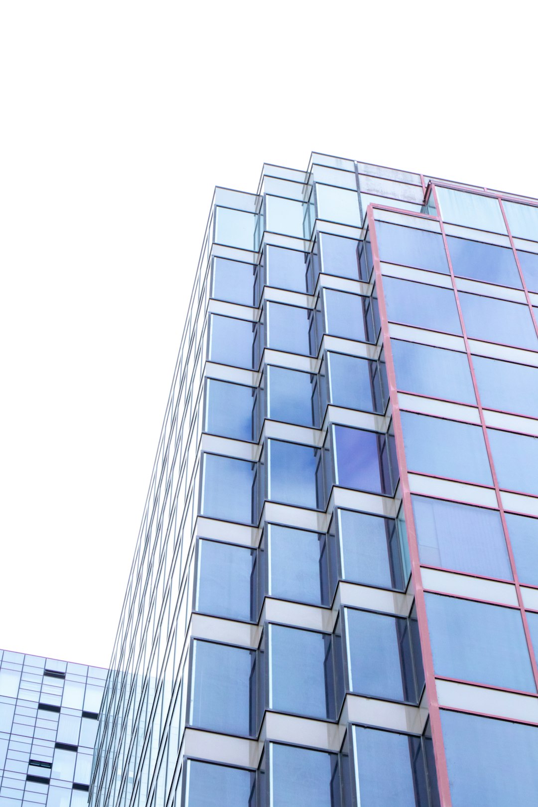 curtain wall high-rise building during daytime