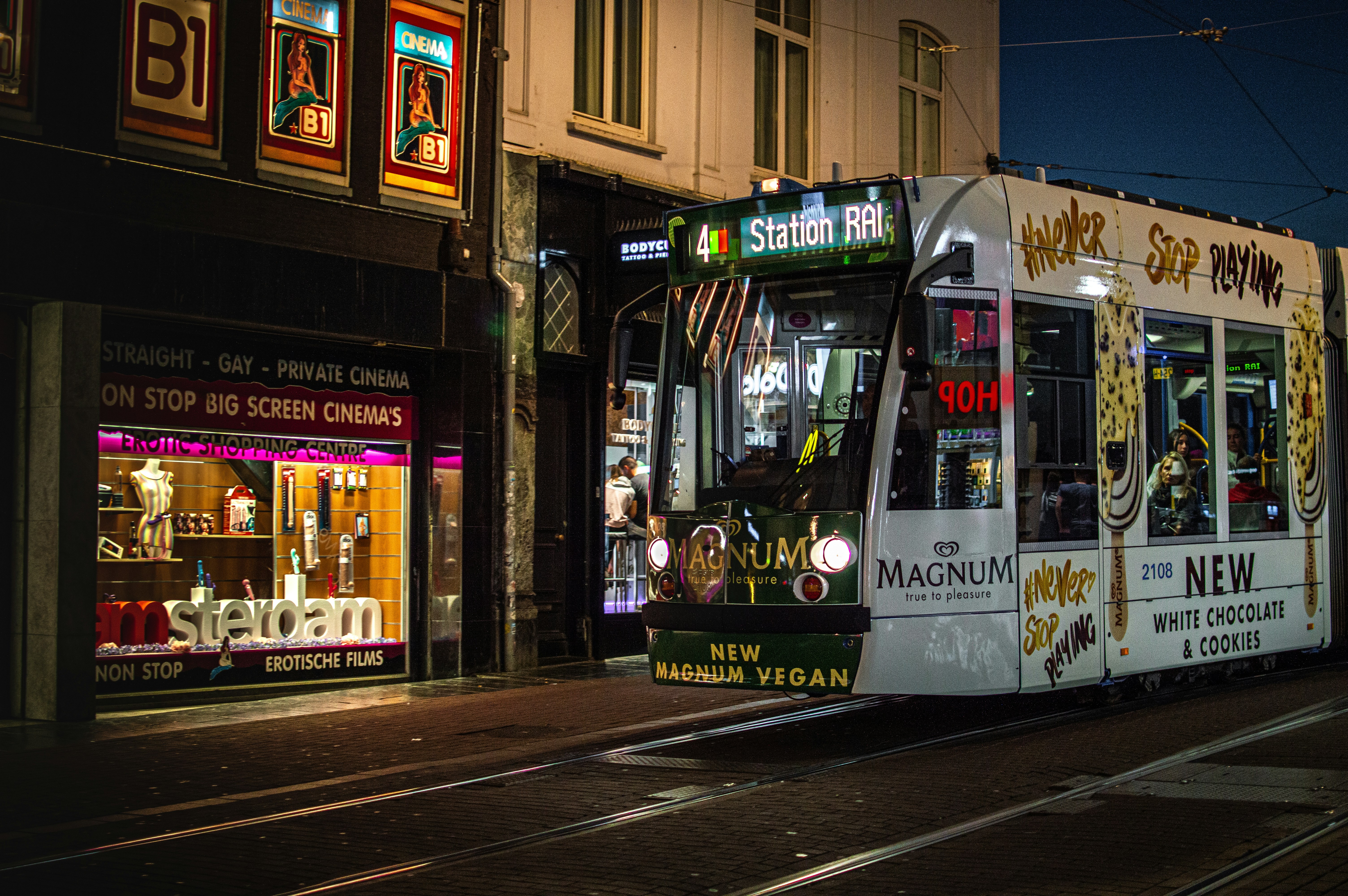 white and green city train, Nightlife in Amsterdam