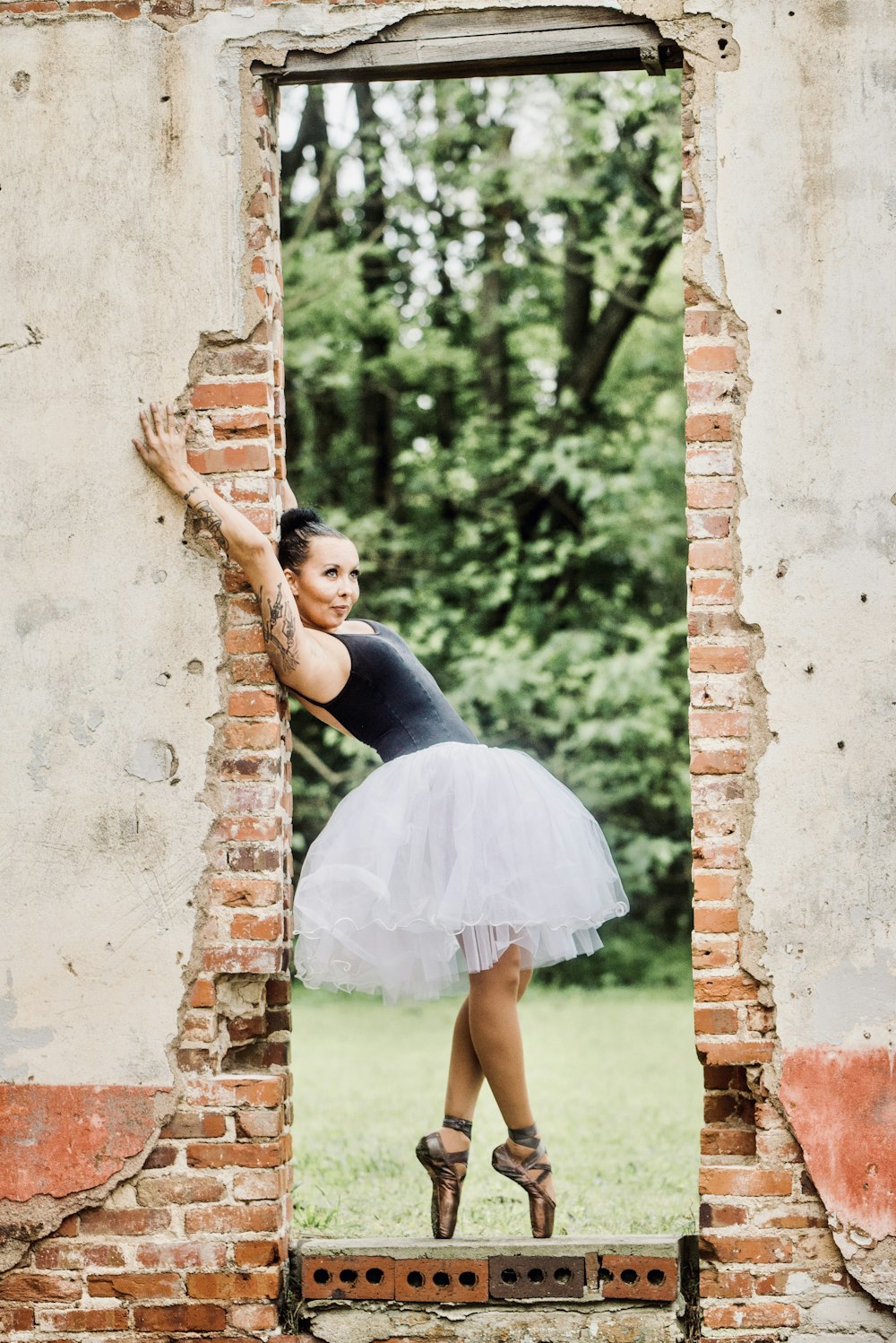 woman wearing black and white Ballerina dress and shoes