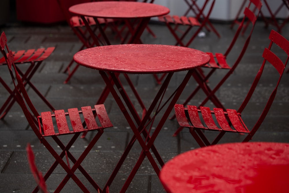 shallow focus photo of round red wooden table