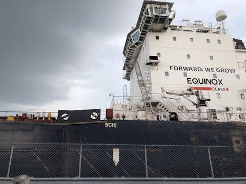 white and black Equinox cargo ship