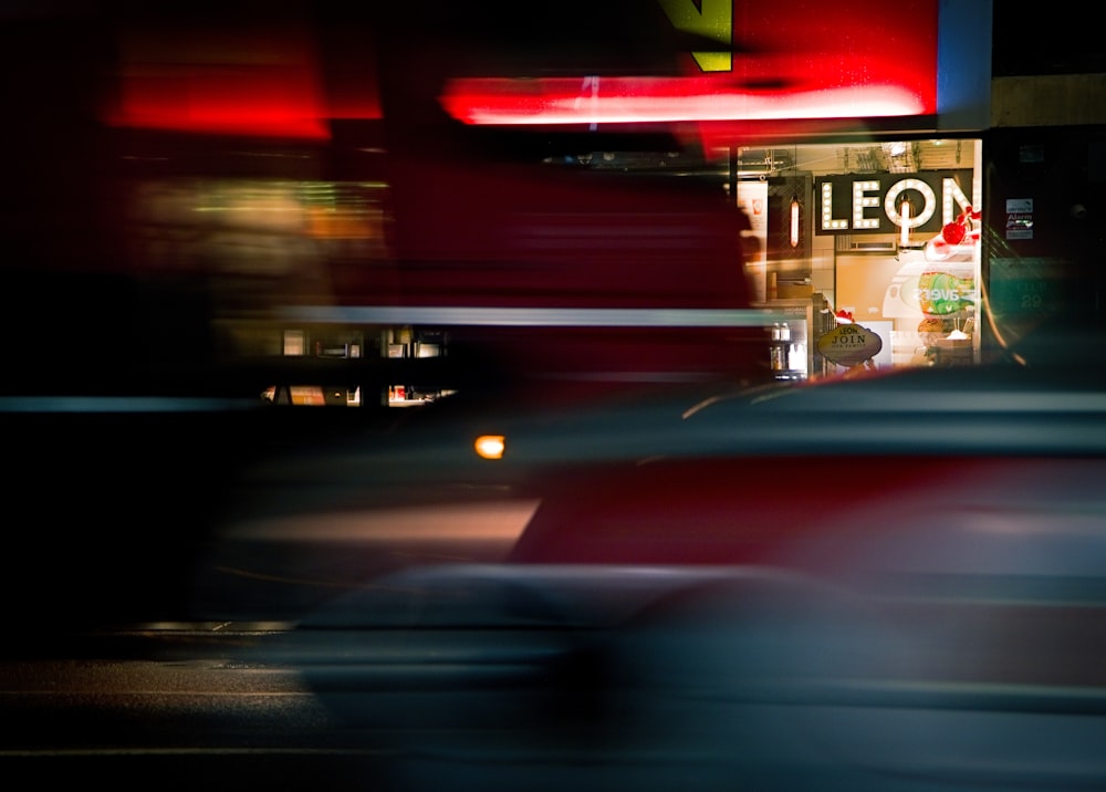 a blurry photo of a store front at night