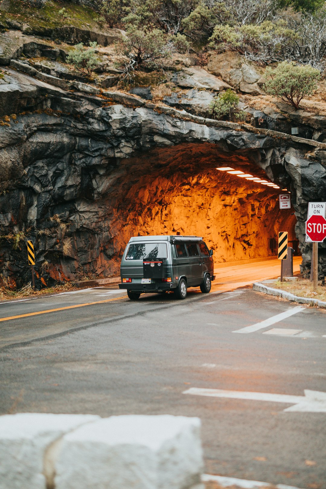 gray SUV on aslpath road tunnel