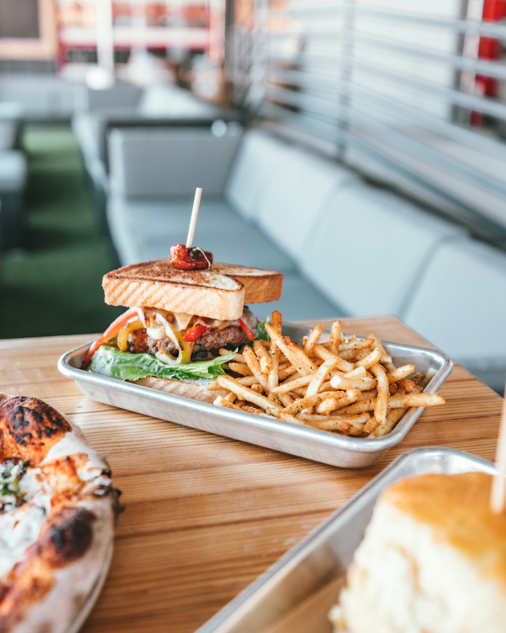 sandwich and fries on tray