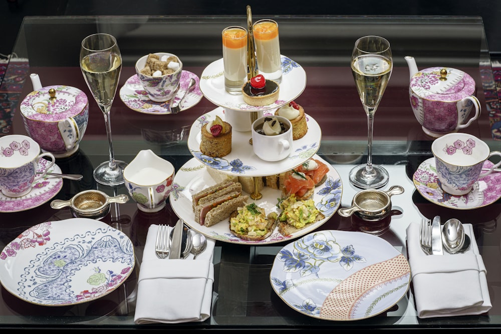 assorted pastries in rack between plates