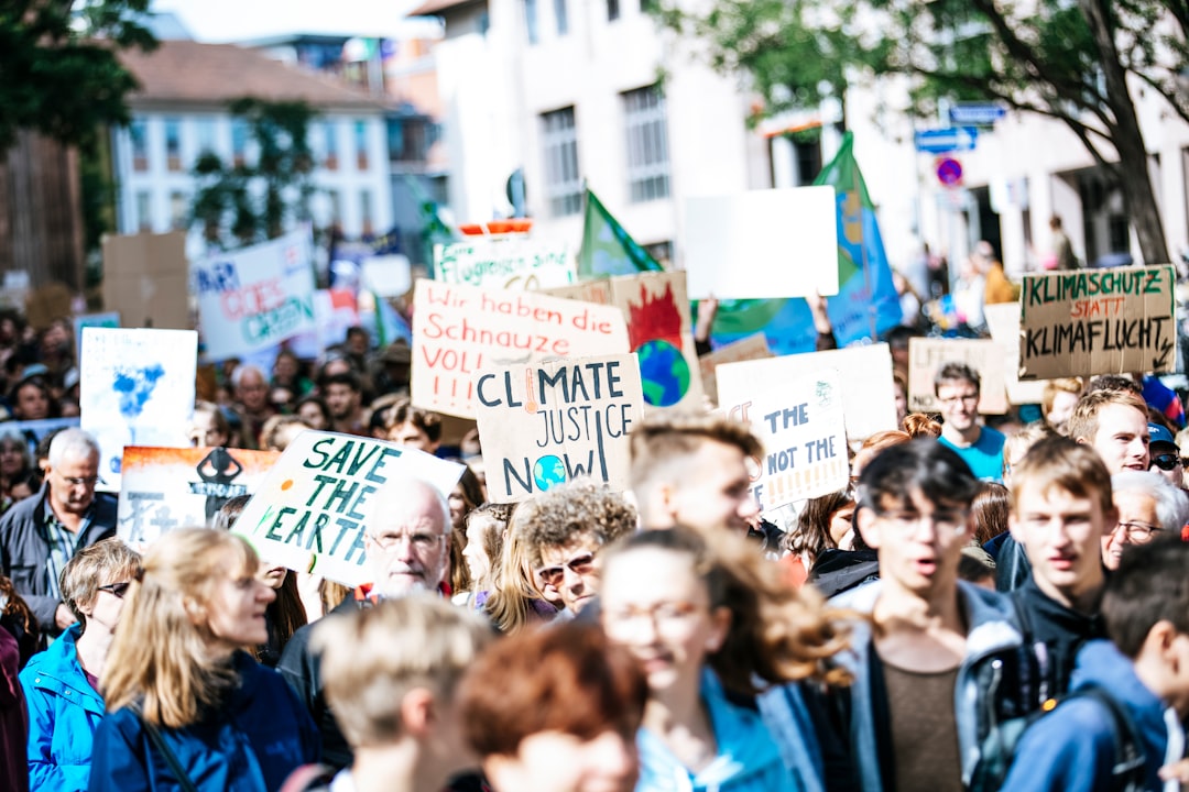 CLIMATE JUSTICE NOW – SAVE THE EARTH. Climate strike protest demonstration. Fridays for future.
