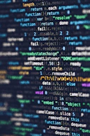 computer programming codes displayed on a monitor