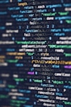 computer programming codes displayed on a monitor