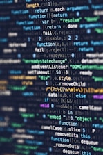 computer programming codes displayed on a monitor