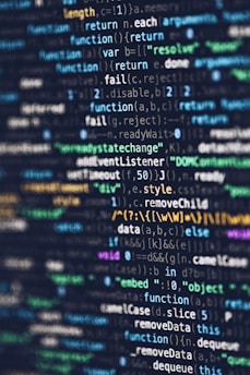 computer programming codes displayed on a monitor