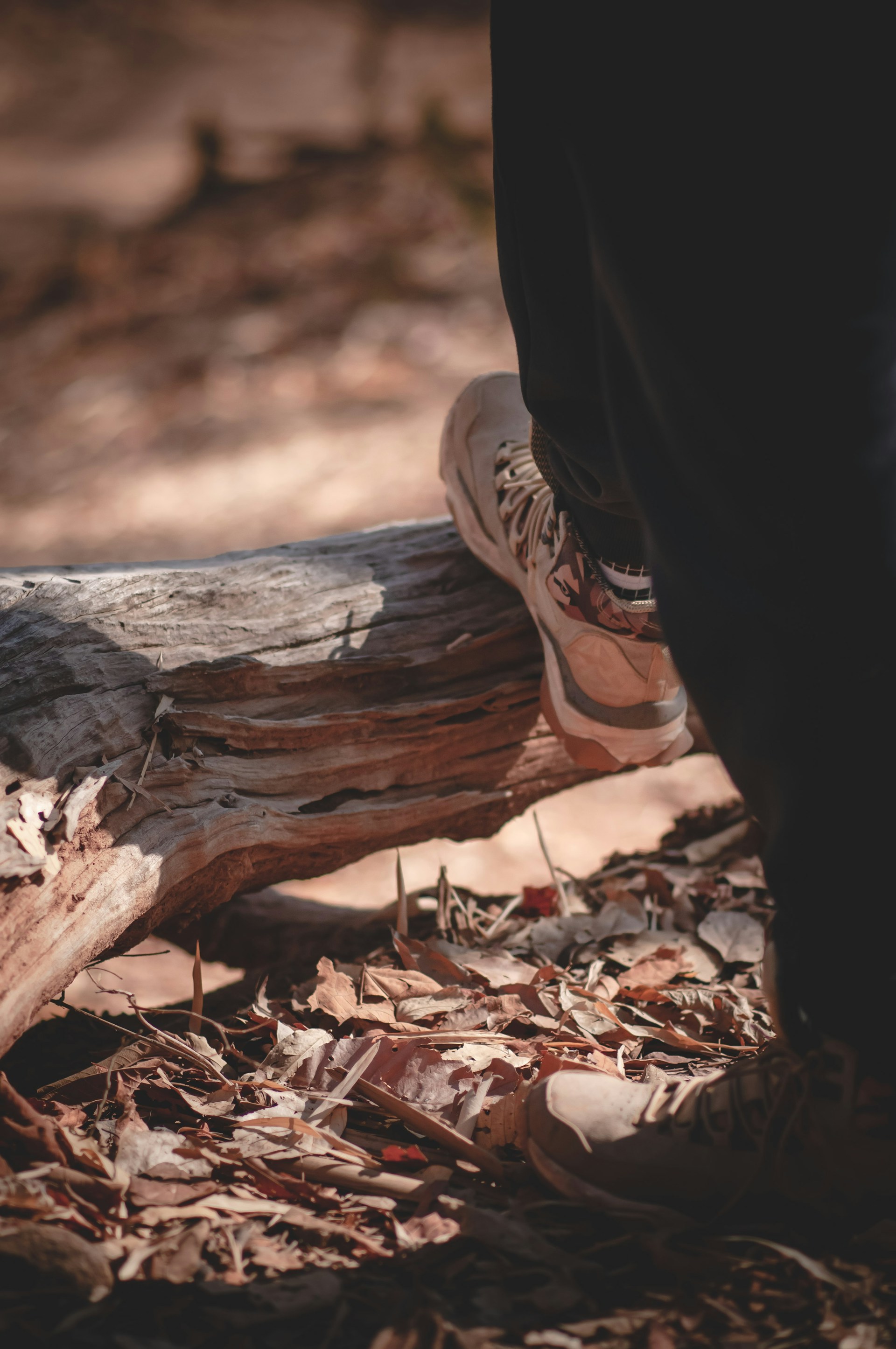 woman wearing yellow long-sleeved dress under white clouds and blue sky during daytime