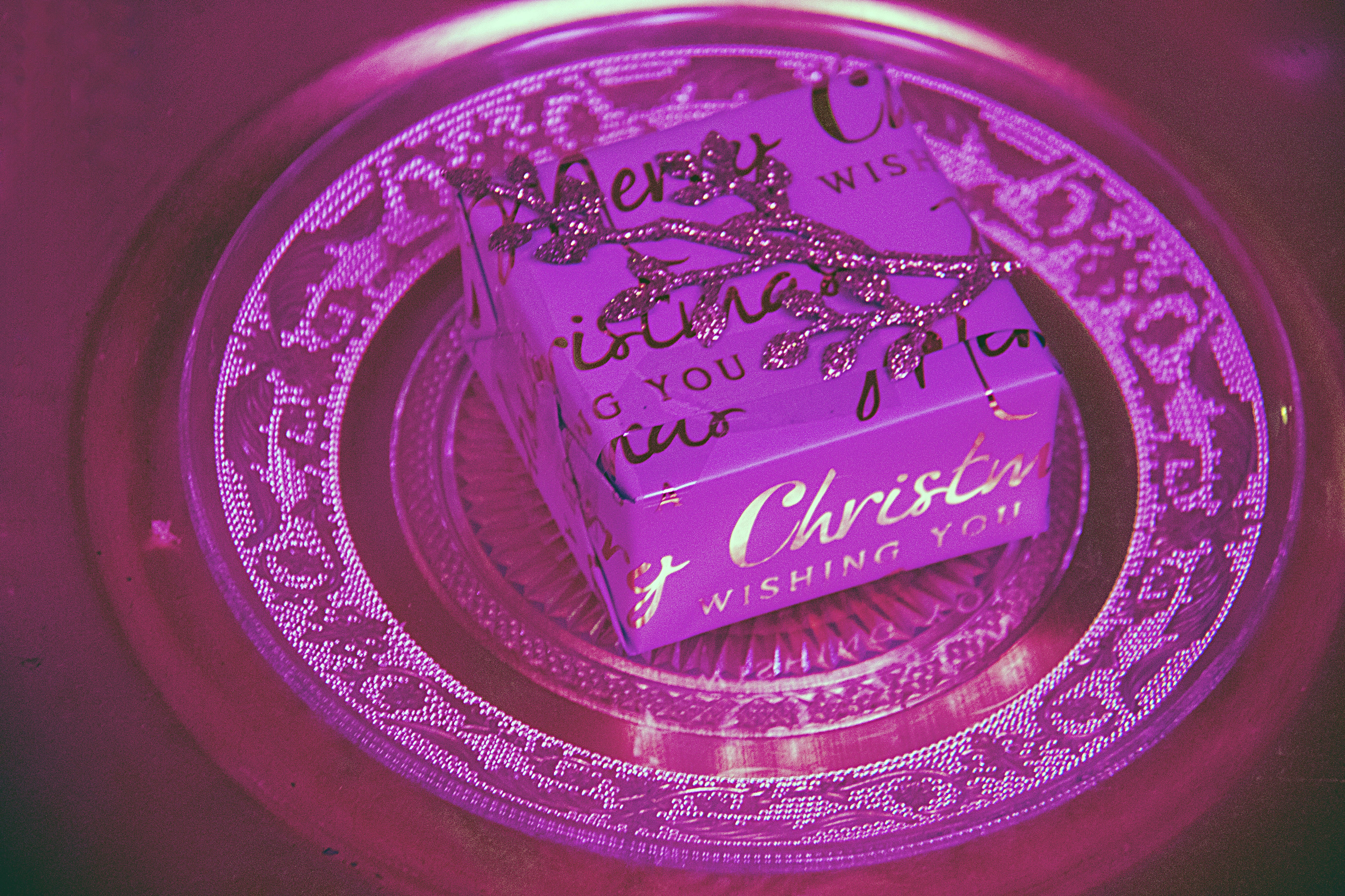 a couple of pieces of cake sitting on top of a glass plate