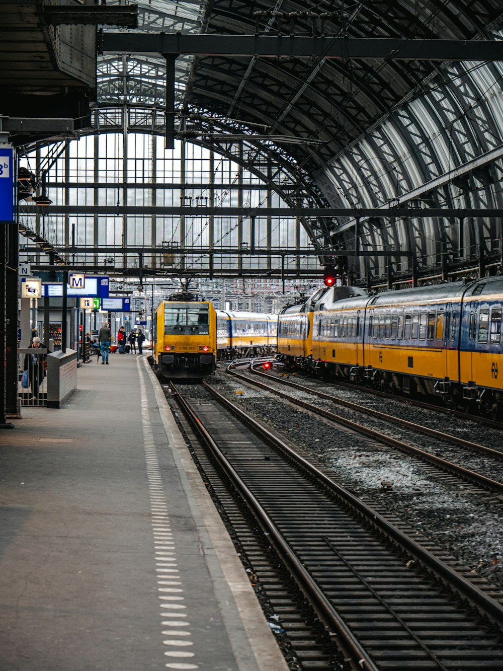 yellow trains during daytime