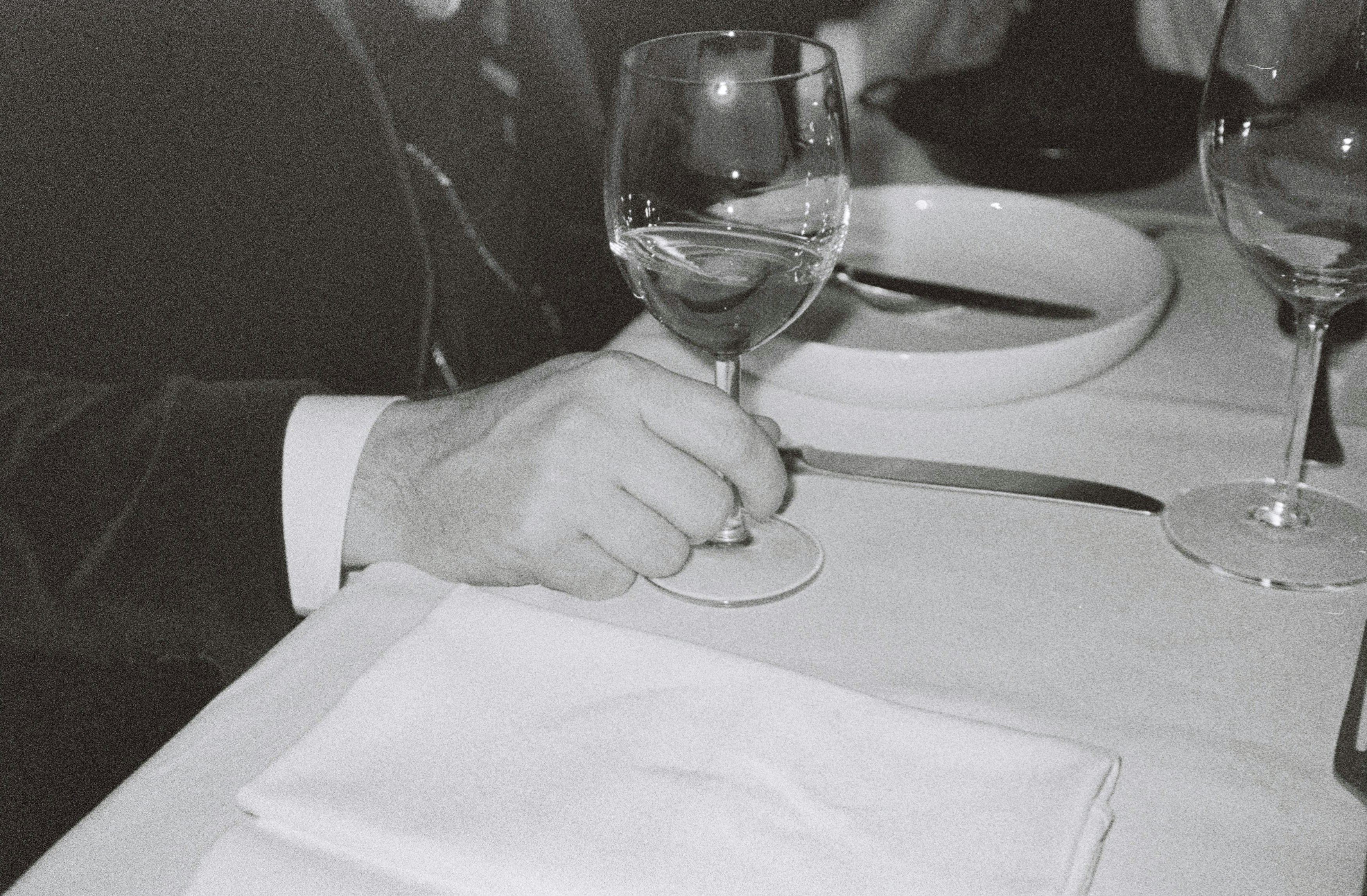 Drinking a glass of wine at the Christmas dinner.