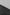 a man riding a snowboard down a snow covered slope