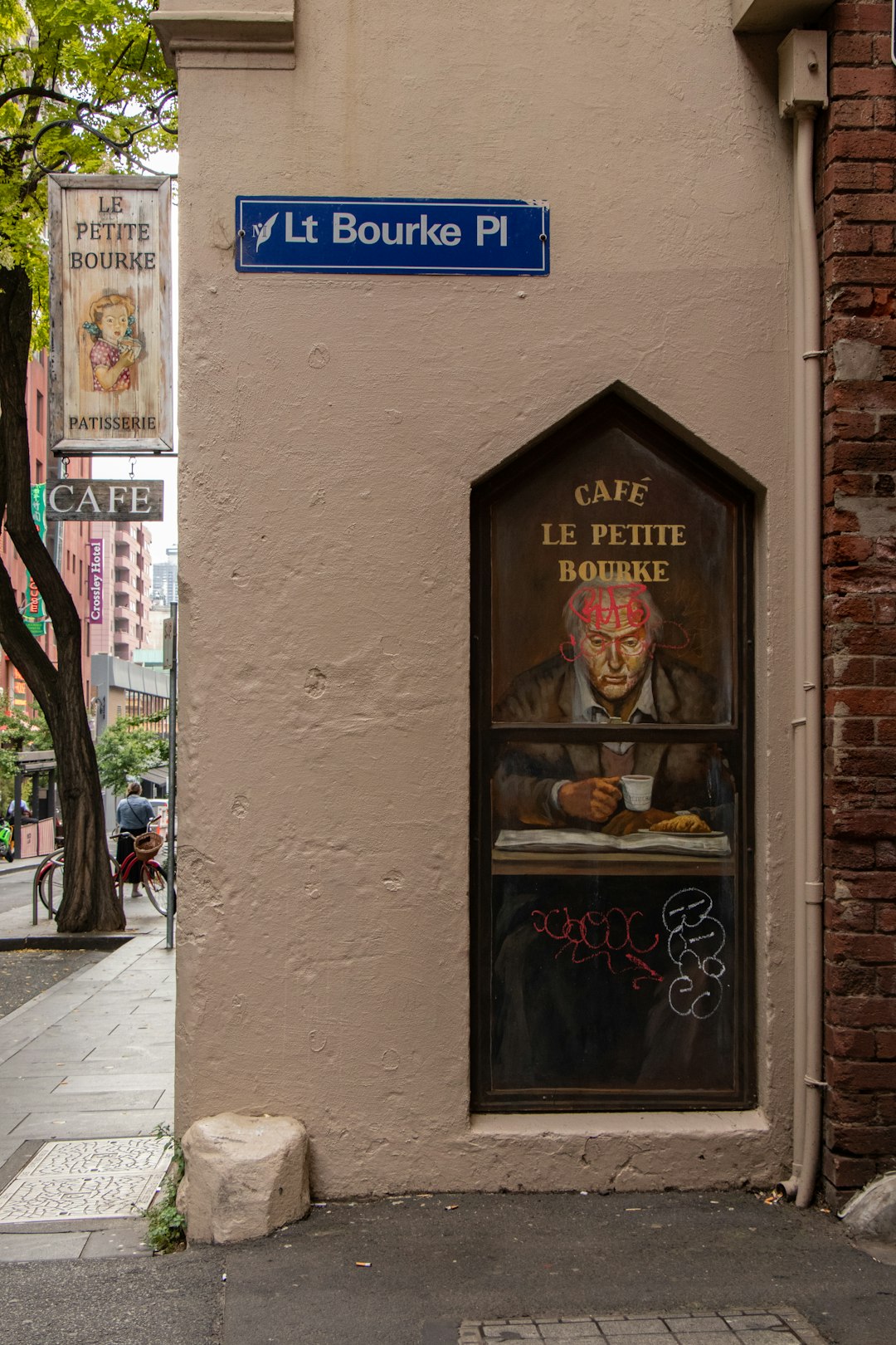 door of Cafe Le Petite Bourne