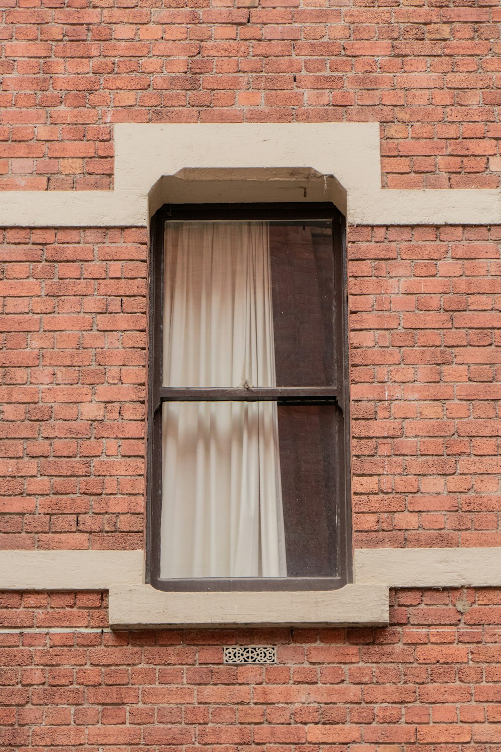 gray wooden framed glass window