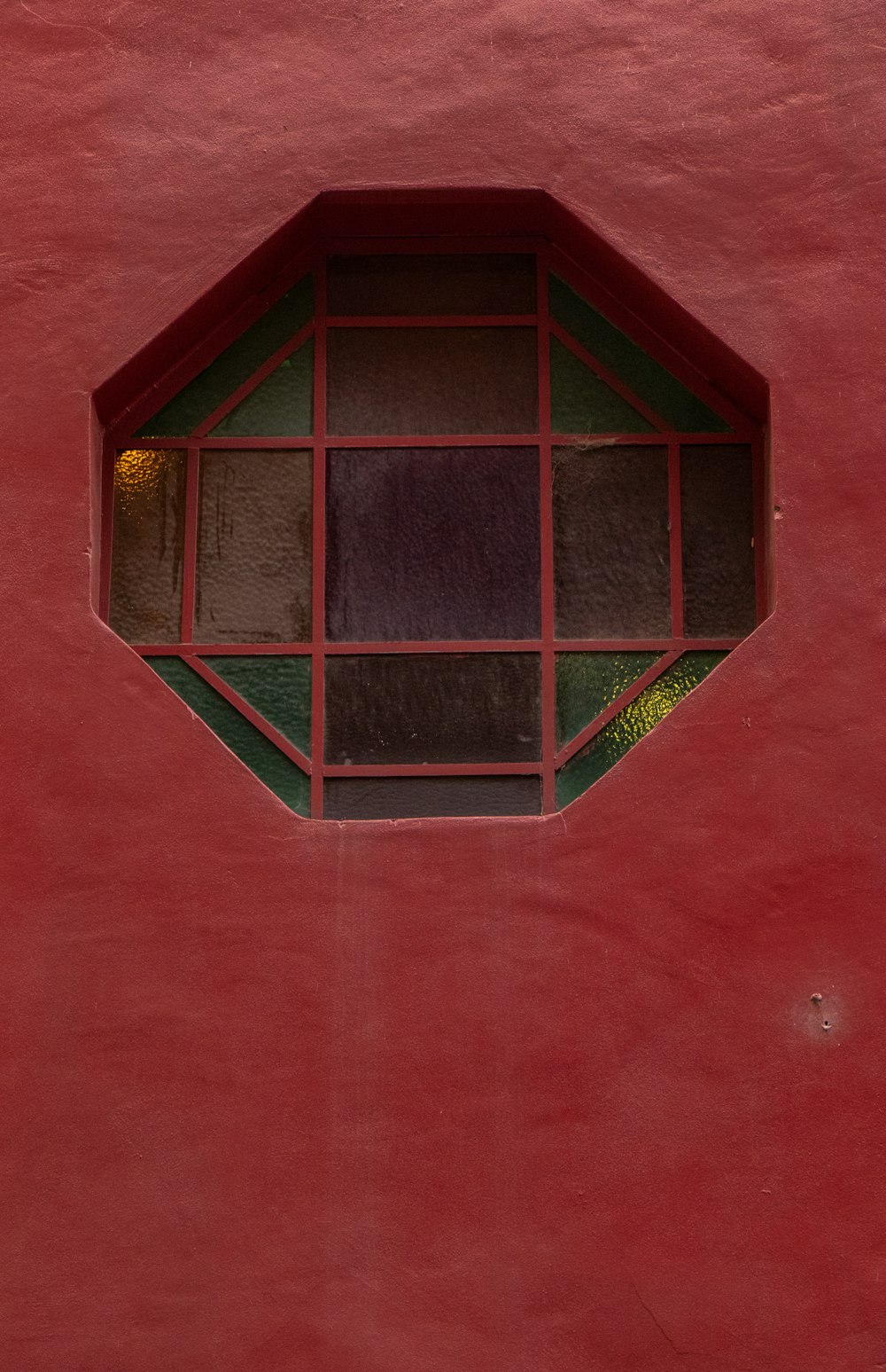 green and brown glass window