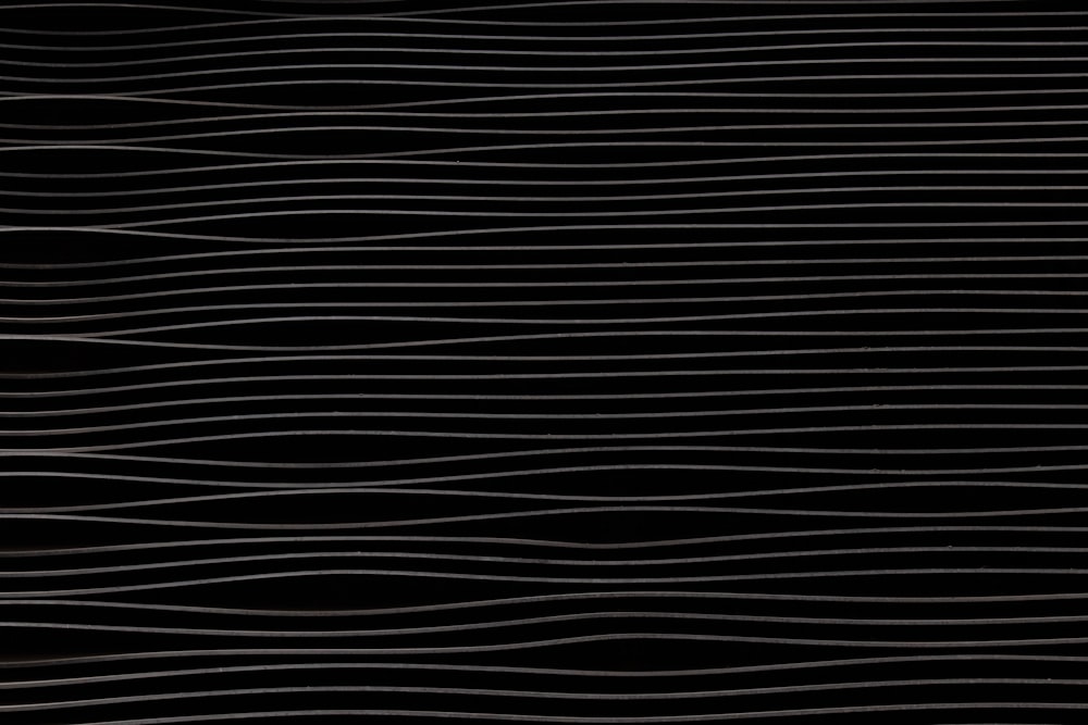 a black background with wavy lines