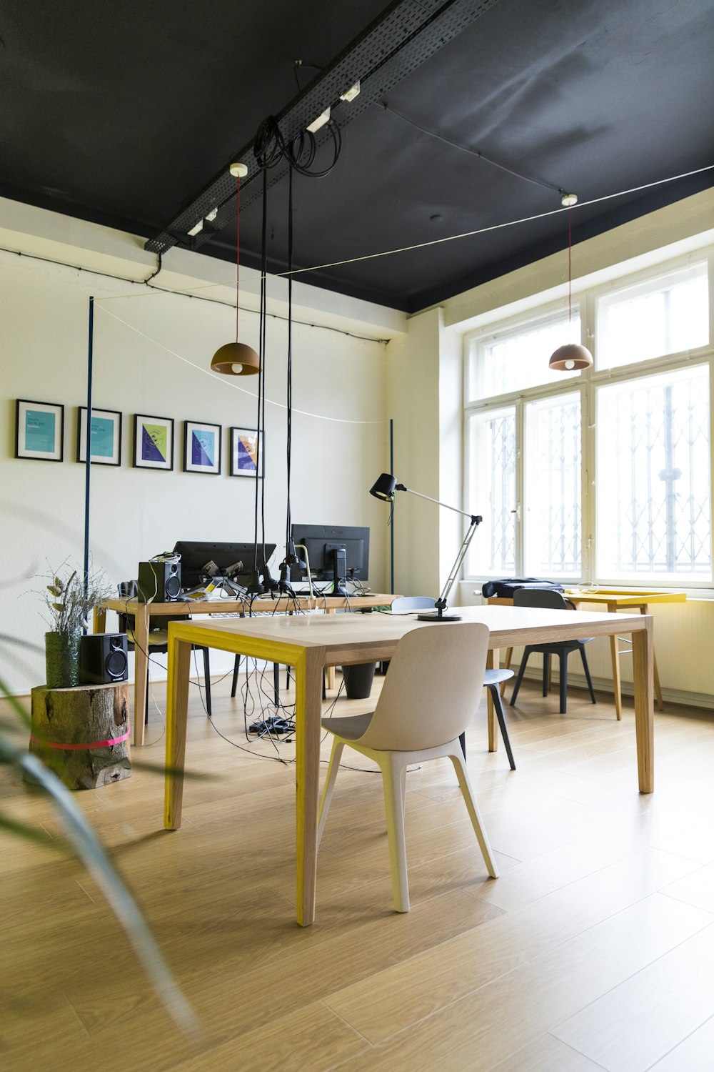 empty brown chair beside table with lamp