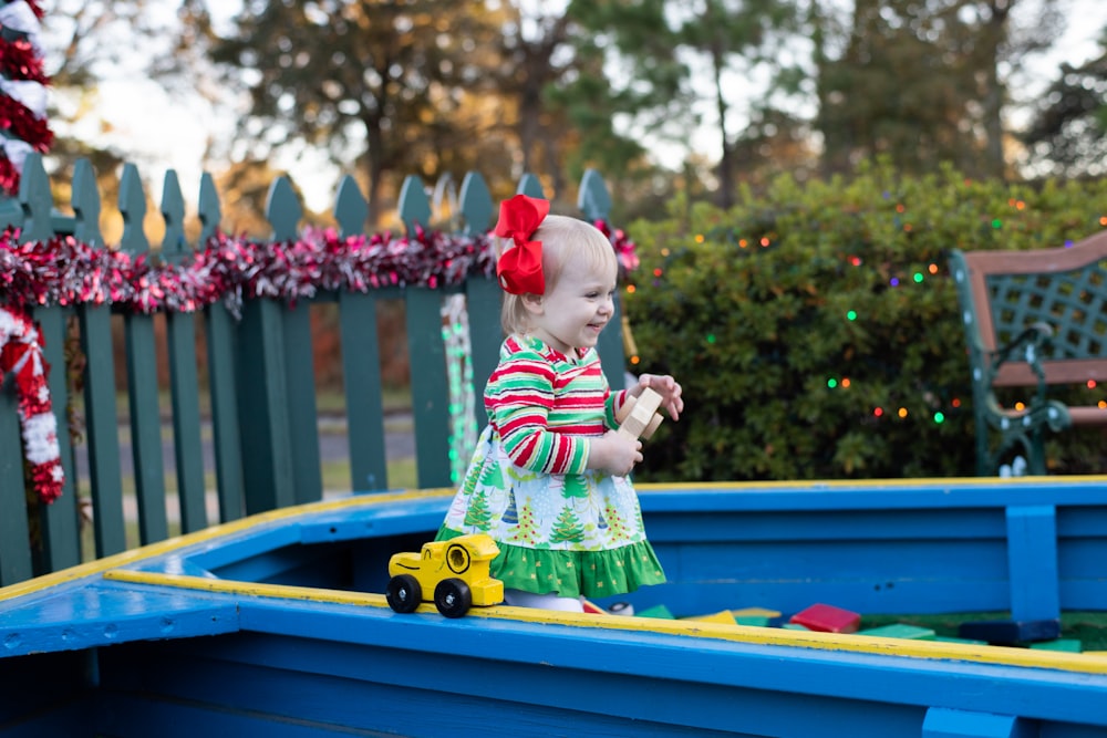 smiling girl inside playground