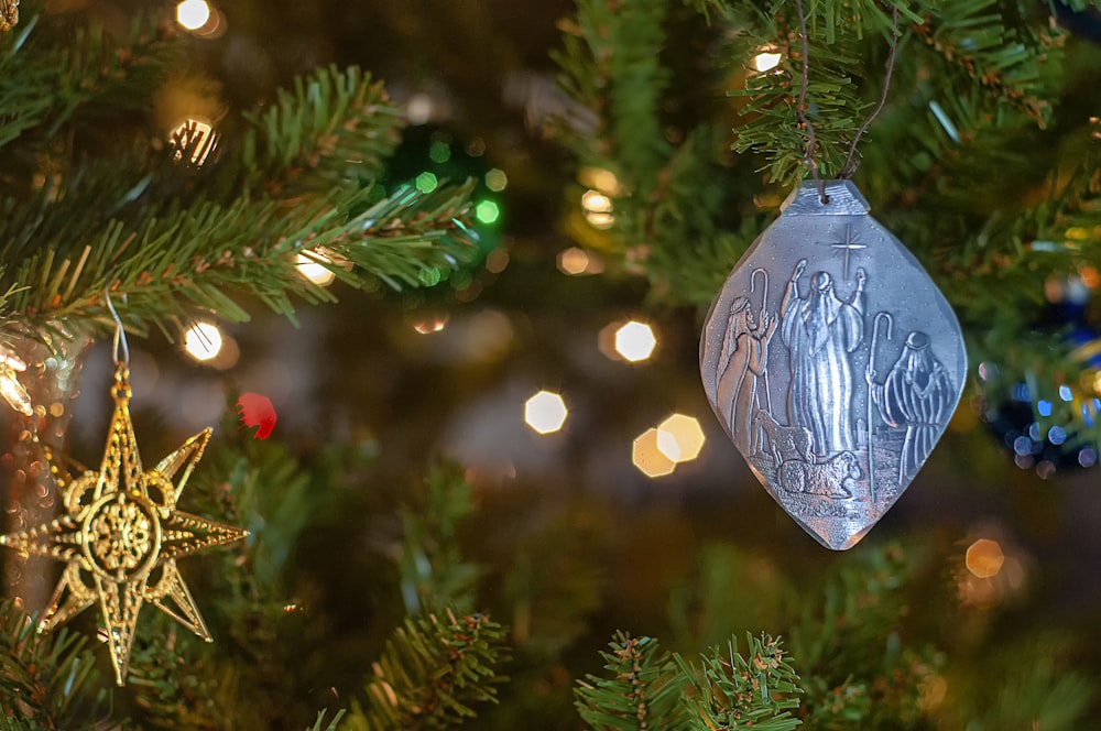 selective focus photography of ornaments hanged on green pine tree