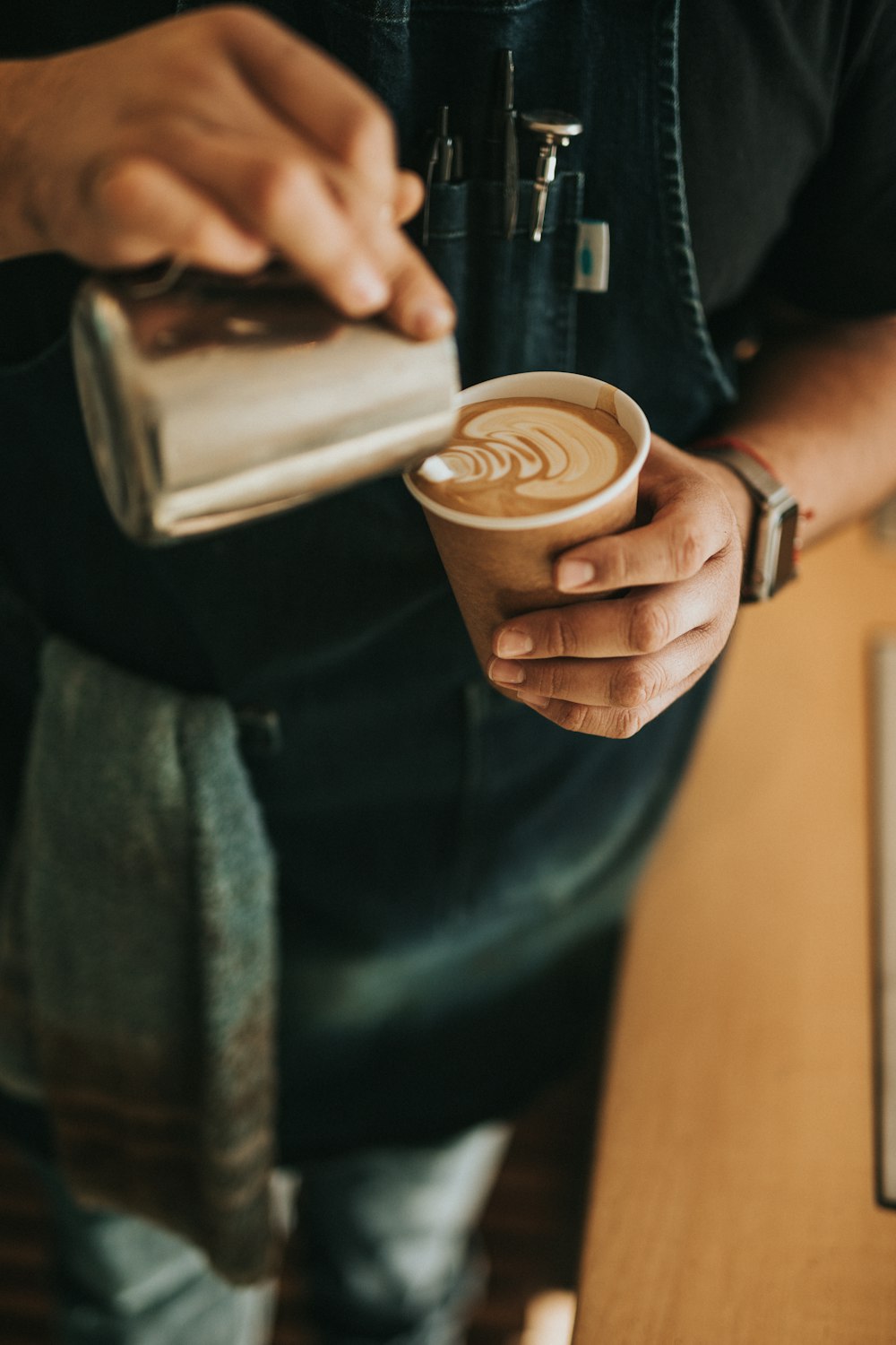 person making coffee