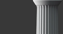 a tall white pillar with a black background