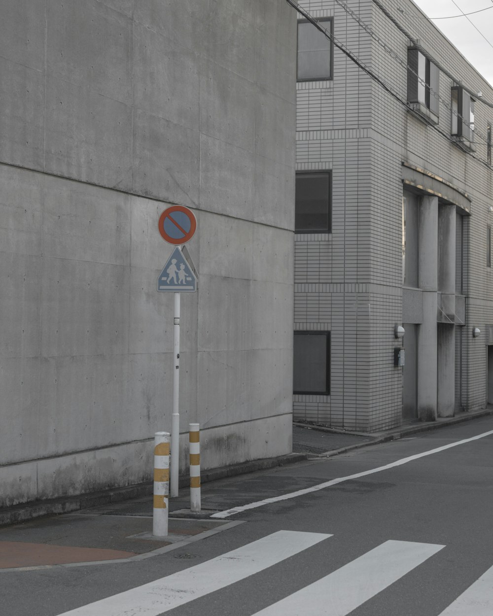 a street corner with a street sign and a building