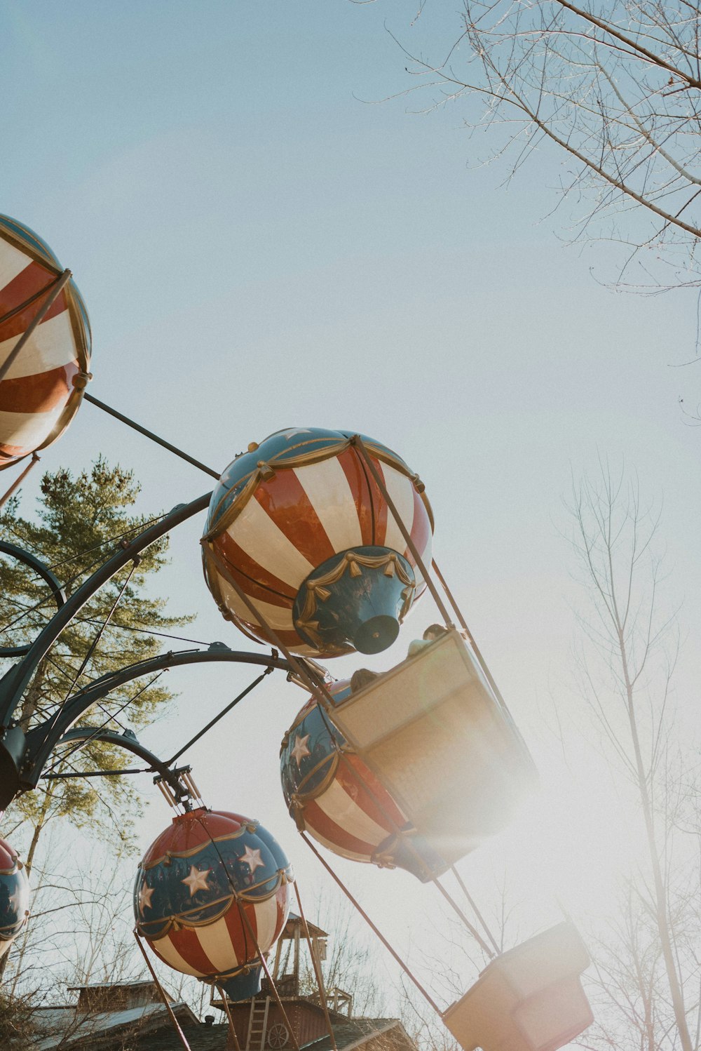 a number of hot air balloons in the air