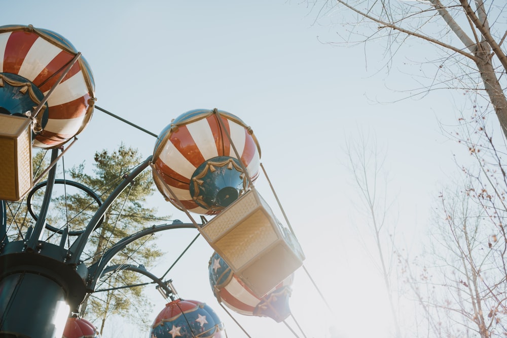 white and red amusement ride during daytime