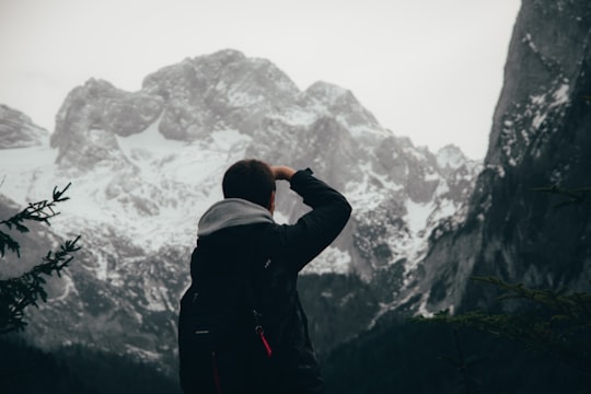 man on mountain in Gosau Austria