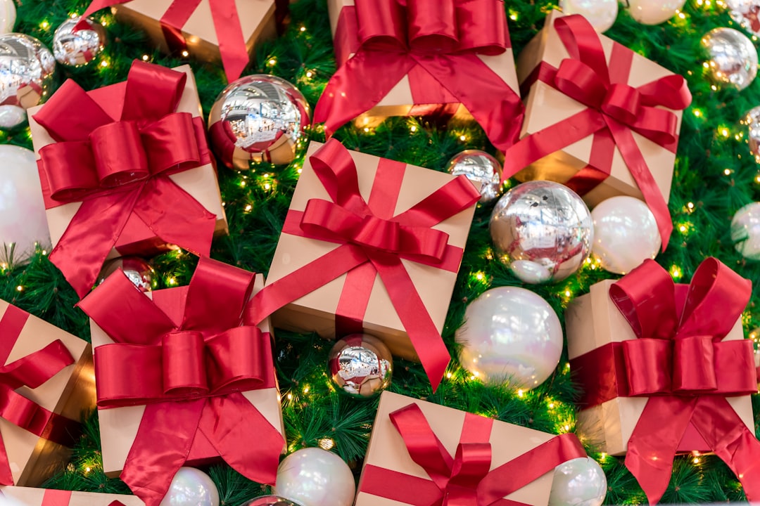 brown gift box with red bow