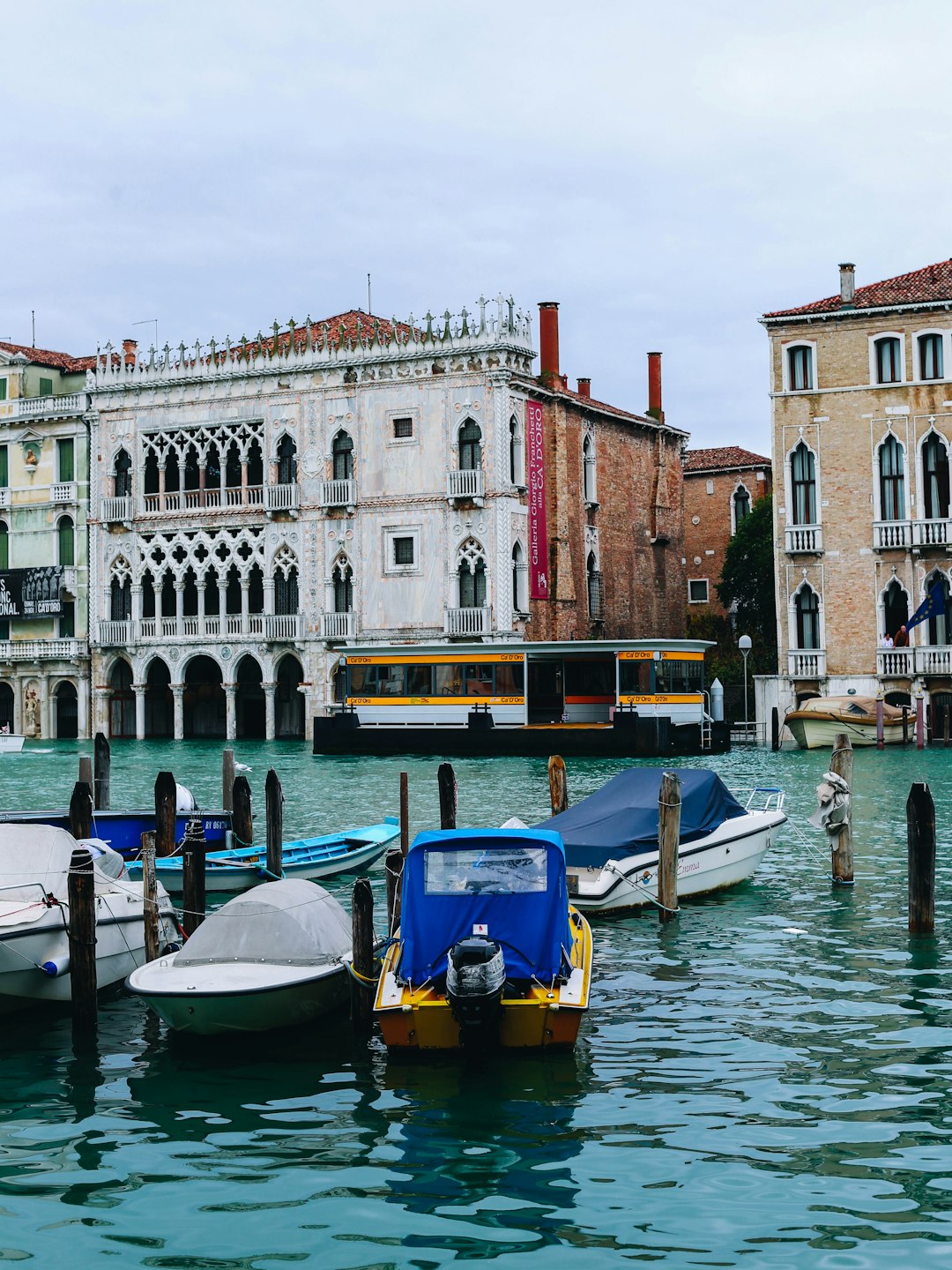 parked boats near buildings