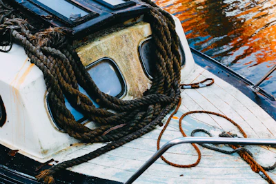 Detailed shot of a flexible rubber seal designed for an antique boat hatch