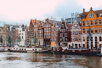a group of boats that are sitting in the water
