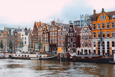 a group of boats that are sitting in the water