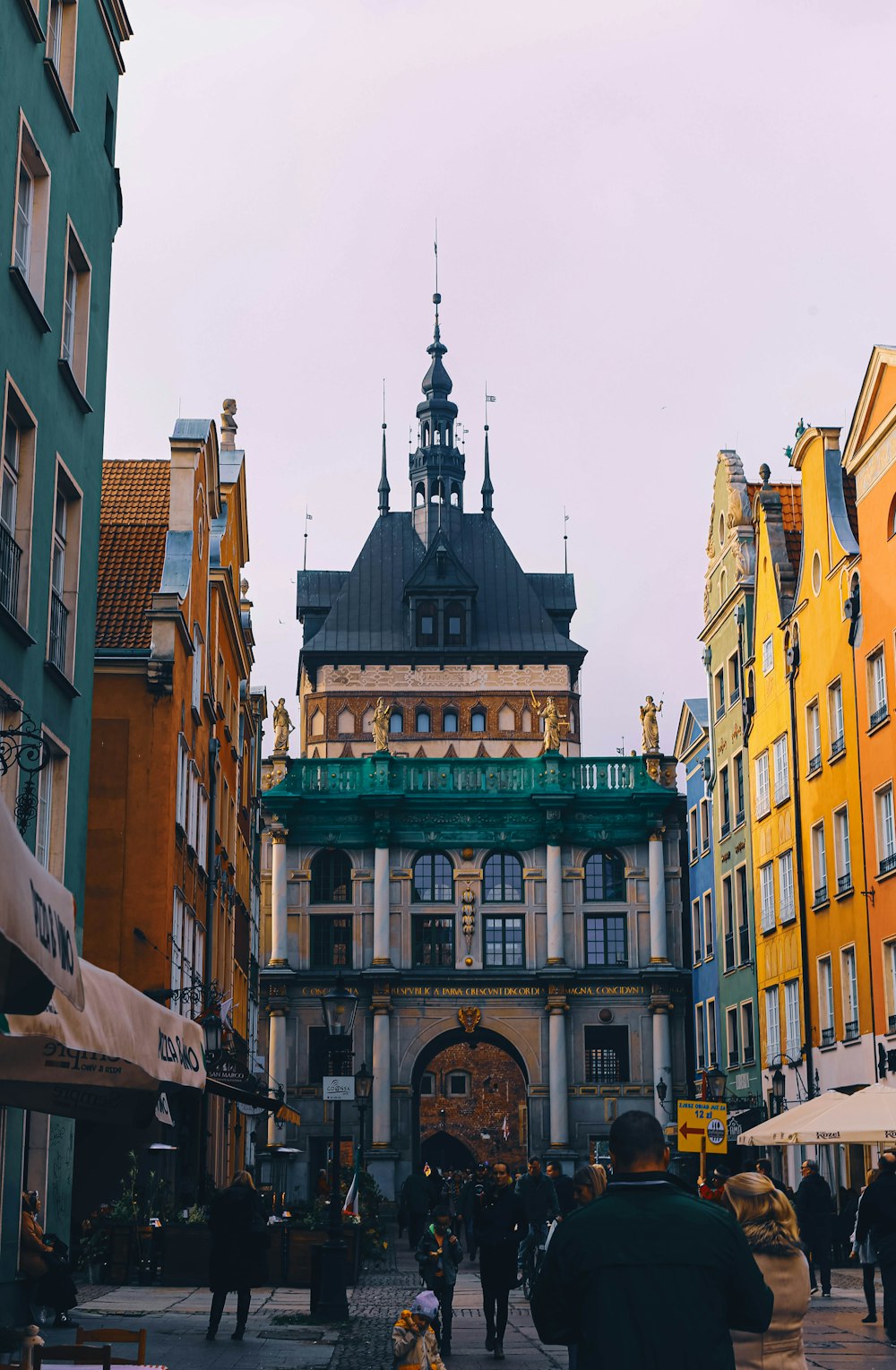 people near buildings during day