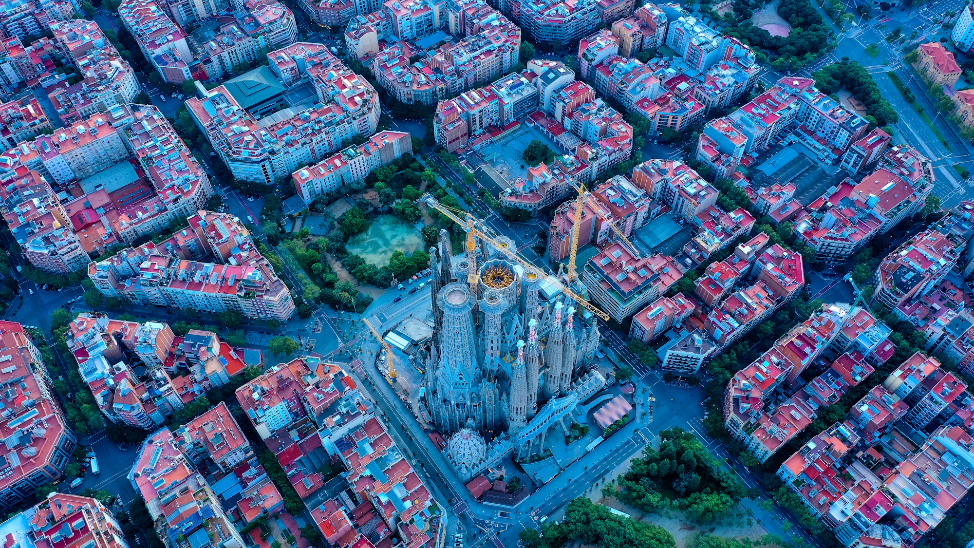 Barcelona rooftops and the Sagrada Familia at golden hour